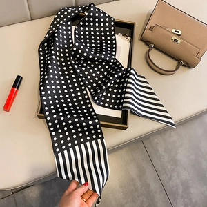 French style polka dot silk scarf for women shown with handbag and accessories