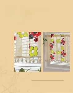 Detail of vintage beige lace cafe curtain with yellow flowers and ladybug embroidery