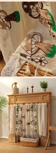 Detail of lace coffee curtain with mushroom embroidery and handmade fringe tassels