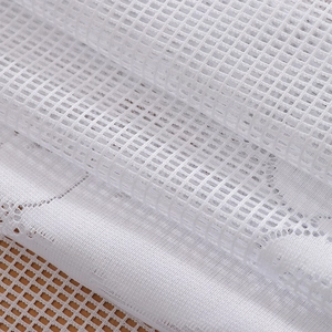 White French lace cafe curtain with square grid mesh and floral embroidery detail