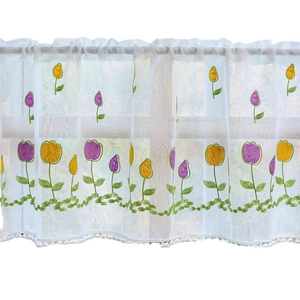 White semi-sheer cafe curtain with embroidered tulips and pom-pom trim for window