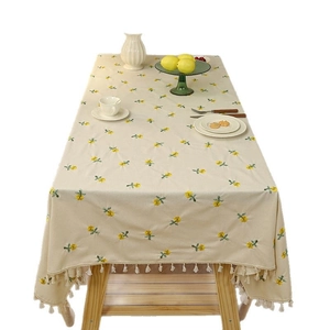 Waterproof cream tablecloth with yellow flower embroidery and elegant white tassels