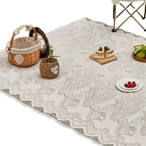 Retro cream picnic mat with tulip pattern and hollow lace trim for outdoor camping