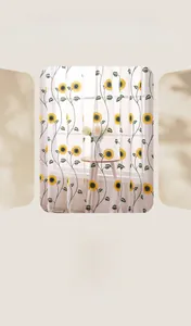 Detail of sunflower embroidery on white sheer curtain with elegant floral pattern