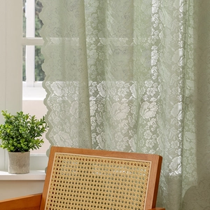 Modern light green floral lace curtain with wavy edges for a cozy balcony ambiance
