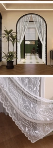 Detailed embroidery texture of white lace door curtain with birds and branches pattern