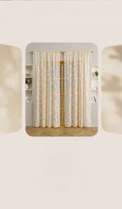 Detail of cream lace curtain featuring delicate floral jacquard and light filtering fabric