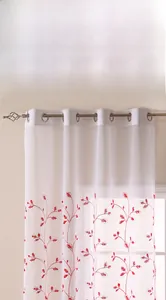 Detailed embroidery of red leaves on white semi-transparent sheer curtain with metal grommets