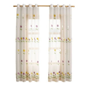 Modern white sheer curtains with yellow and purple tulip embroidery and silver metal grommets