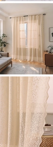 Detail of beige lace curtains showing floral cutout patterns and scalloped wave edges