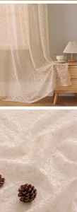 Detailed embroidery on French creamy white lace sheer curtain with floral mesh patterns