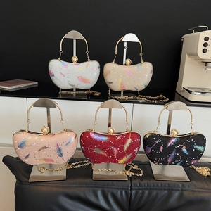 Bolso de fiesta brillante con diseño de plumas y cierre de perlas en cinco colores