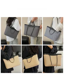Detailed look at large capacity tote bags in grey and beige for professional daily styling