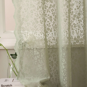Light green floral lace curtains with scalloped edges for a fresh balcony atmosphere