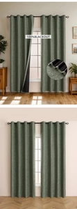 Detail of sage green curtains showing 100% blackout backing and floral relief texture