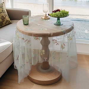 Green sheer floral embroidered tablecloth with forget-me-not patterns for round tables