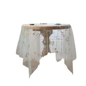Round mesh tablecloth with floral butterfly embroidery and elegant cursive lettering