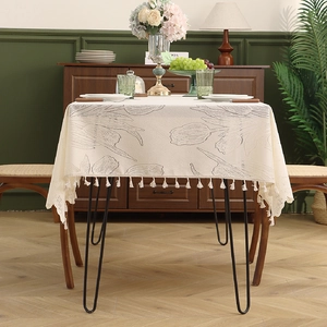 Beige rectangular lace tablecloth with grey tulip patterns and fringe tassels