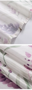 Macro detail of lavender print sheer cafe curtain fabric with fine mesh texture
