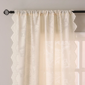 Elegant cream tulip embroidered lace curtain with scalloped edges for a cozy home atmosphere