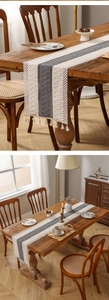 Detalle de camino de mesa bohemio con patrones de punto a rayas y borlas decorativas