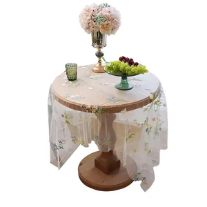 Floral embroidery white mesh lace tablecloth on round wooden table for home decor