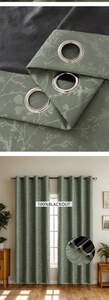 Detail of sage green curtains with 100% blackout backing and leaf pattern jacquard