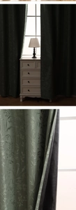 Detail of dark green jacquard blackout curtain with leaf texture and scene display