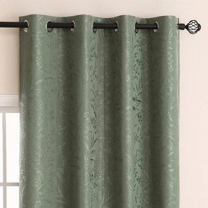 Sage green blackout curtains with embossed leaf pattern and silver metal grommets