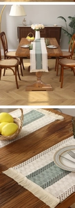 Dettaglio di runner da tavola all'uncinetto con strisce beige-verdi e nappe lunghe