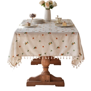 Rectangle cream cotton linen tablecloth with floral embroidery and white fringe edges