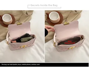 Internal view of pink lace embroidery bag showing spacious main compartment for phone
