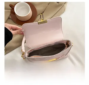 Internal view of pink lace embroidered shoulder bag with large capacity and zipper pocket