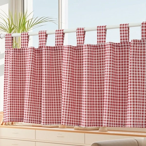 Red and white checkered cafe curtain made of thick cotton linen hanging on a white rod