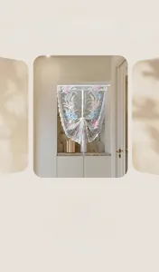 Detail of white roman blind with lily flower embroidery and scalloped lace edges