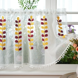 Semi-sheer white cafe curtain with leaf embroidery and white pom-pom trim for kitchen