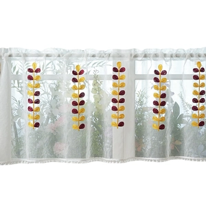Sheer white short curtain with leaf embroidery and pom-pom trim for cozy home windows