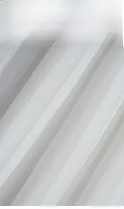 Detail of white striped cafe curtain fabric showing thick vertical texture and translucency