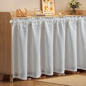 Modern white semi-transparent pleated cafe curtain with vertical textures on a rod