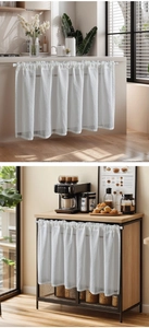 Detail of white vertical striped cafe curtain showing translucent fabric texture on window