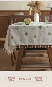 Detailed view of pastoral style thickened linen tablecloth with green cactus embroidery