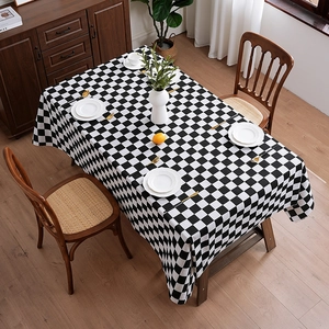 Classic black and white checkered tablecloth in a minimalist Nordic style for dining tables