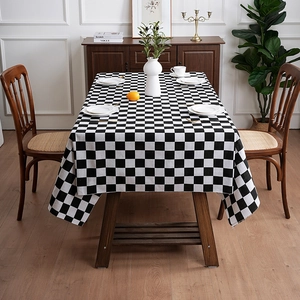 Modern black and white checkered tablecloth in minimalist Nordic style for home decor