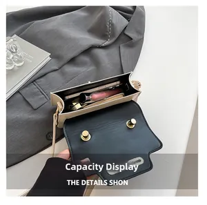 Interior capacity detail showing chic crossbody bag with phone, lipstick and powder