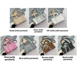Selection of colorful PU leather satchels with lace bow charms and pearl details