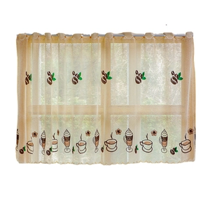 Rustic cafe curtain with coffee embroidery and scalloped edges on a sunny window