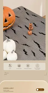 Close-up of Halloween bat pattern lace tablecloth with soft breathable knit texture
