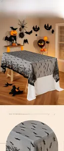 Detailed view of Halloween black lace tablecloth featuring bat and dry tree patterns