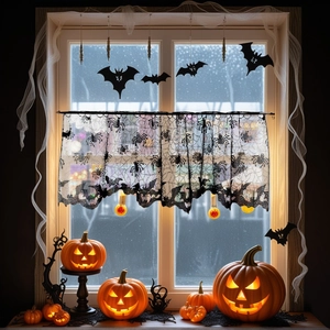 Close-up of black lace Halloween valance with intricate spider web and bat designs