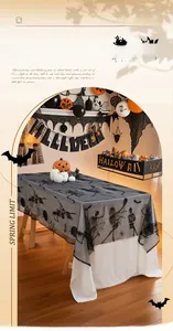 Detail of dual-layer Halloween tablecloth with black lace skull and spider web pattern